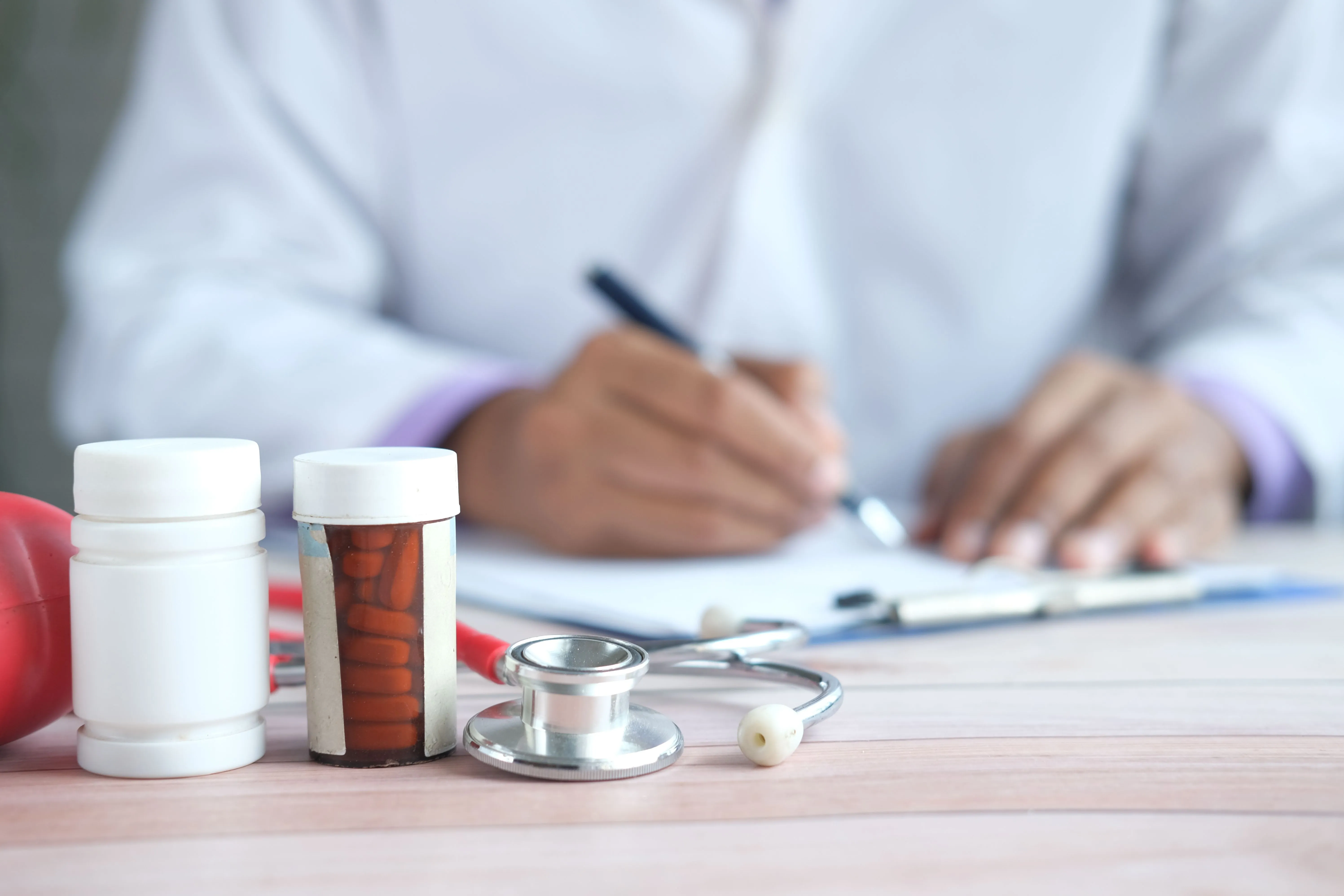 a doctor writing a presciption